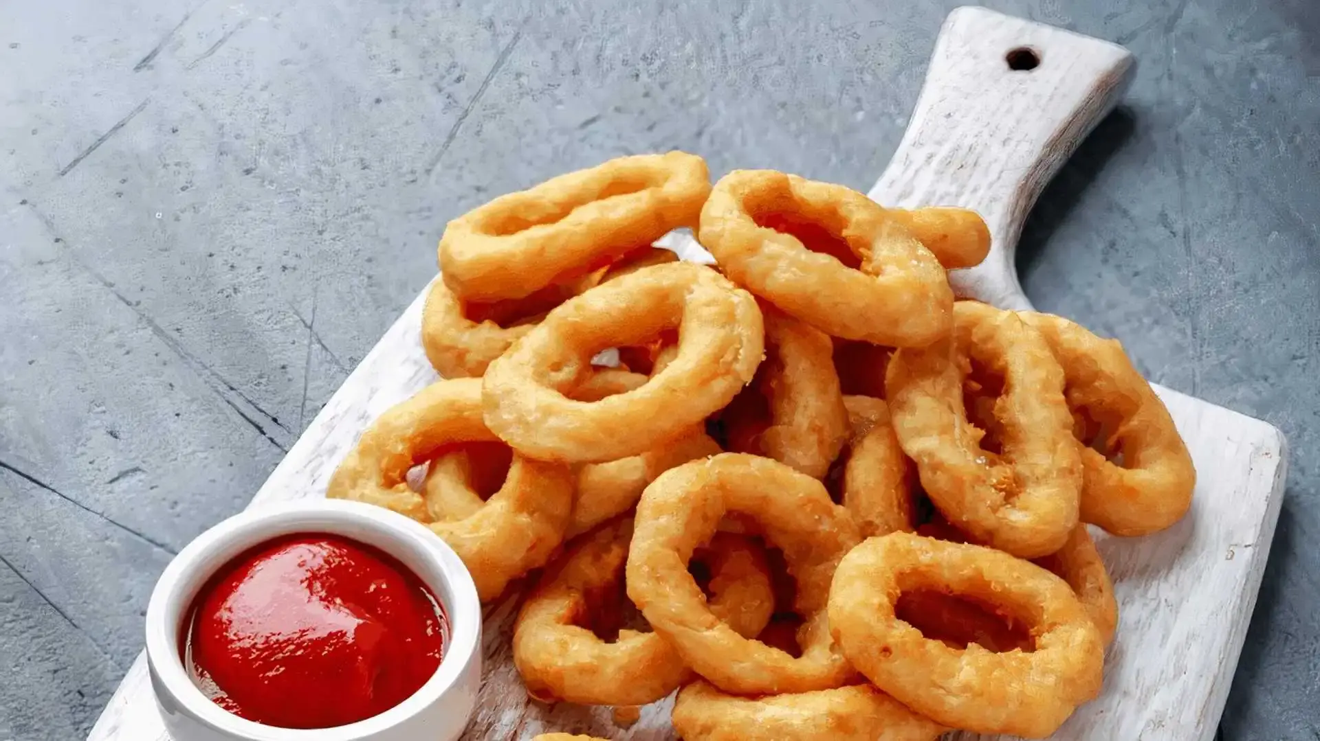 Delicious Onion Rings at Savvy Pizza & Donair in Calgary, AB